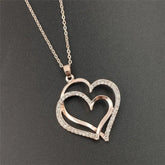 Interlocking Gold Hearts - Downtown Girl